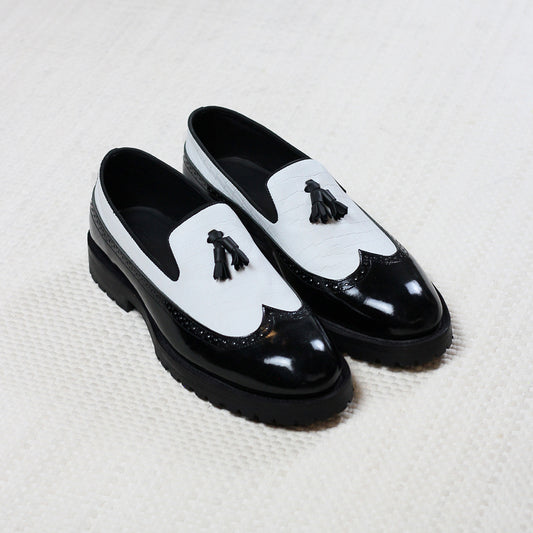 Goodyear welted black and white patent leather wingtip tassel loafers